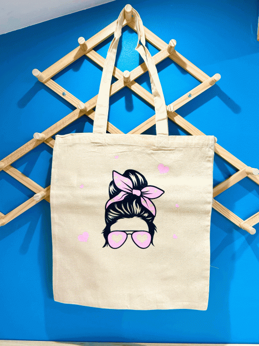 Tête femme noeud rose